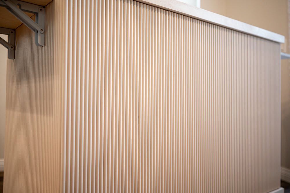 White ribbed event cart front panel with open countertop edge