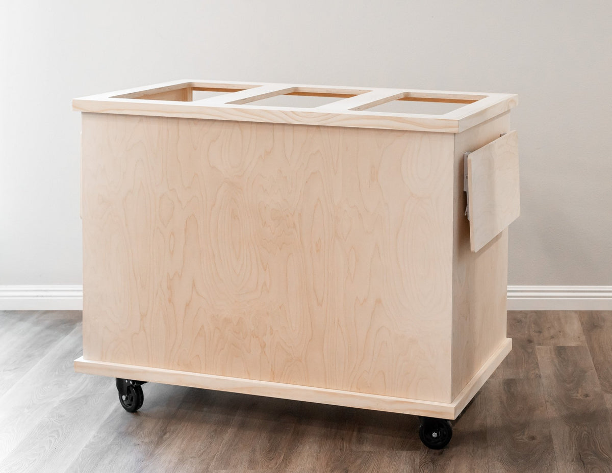 Light wood mobile event cart with slatted top organizer openings and caster wheels